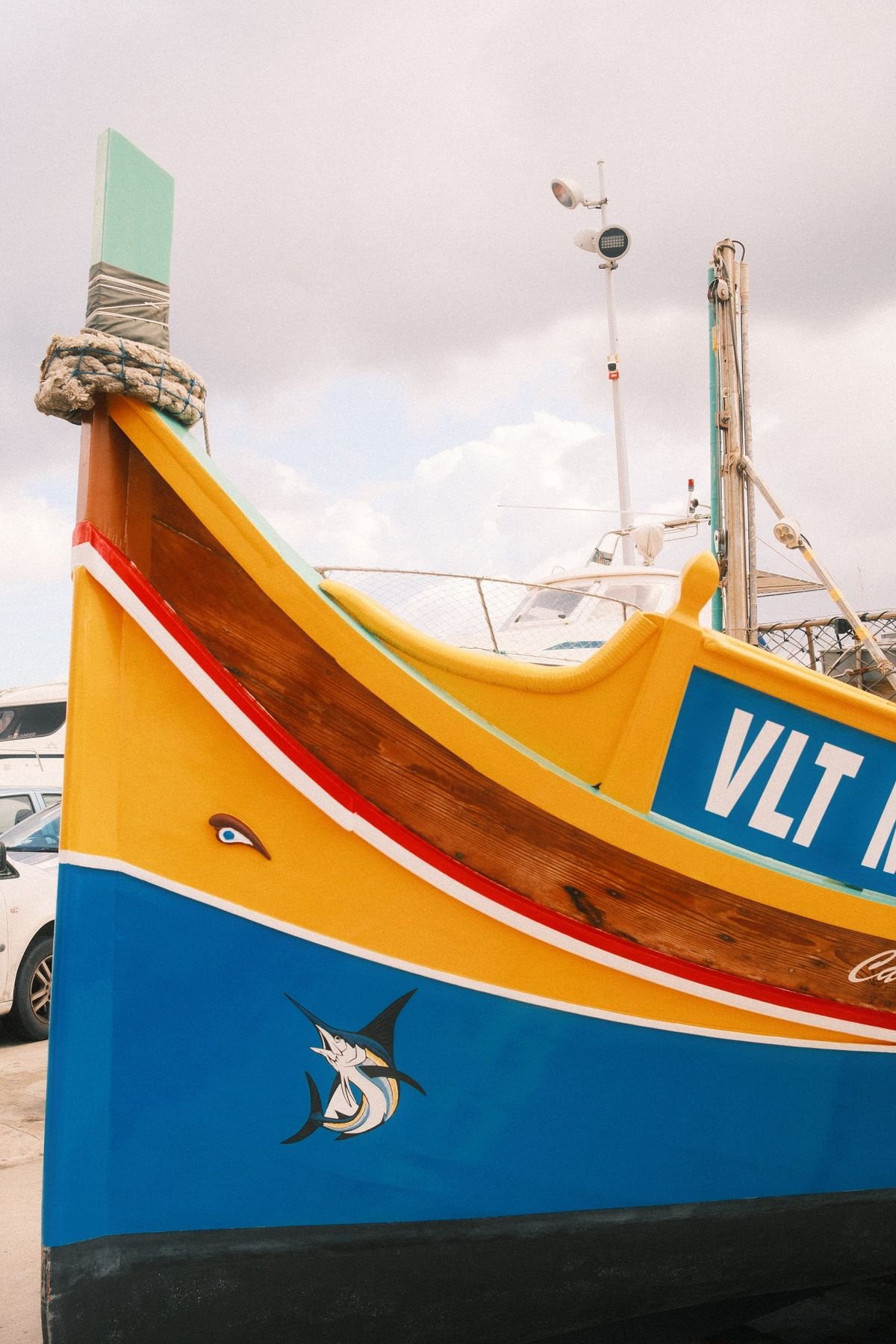 Traditional Maltese Luzzu fishing boat in Marsaxlokk harbour